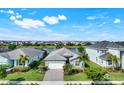 Aerial view of a single-Gathering home with a lake view at 43249 Treadway Dr, Punta Gorda, FL 33982