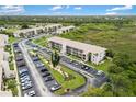 Spacious condo complex offering meticulously maintained landscaping, plentiful parking, and verdant surroundings at 175 Kings Hwy # 625, Punta Gorda, FL 33983