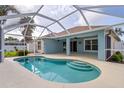 Relaxing screened-in pool area perfect for outdoor entertaining and leisure at 4268 Leesburg Ave, North Port, FL 34288