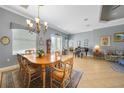 Spacious dining room featuring natural lighting, furniture and decor at 15652 Havana Cir, Port Charlotte, FL 33981