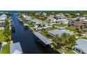 Beautiful home on the water with covered boat lift and quick access to the Gulf at 24261 Captain Kidd Blvd, Punta Gorda, FL 33955