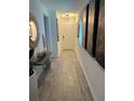 Inviting hallway with neutral color scheme and modern decor at 1992 Sunset Preserve Way, Port Charlotte, FL 33953
