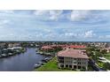Expansive water views and lush green landscaping surround this attractive condo community on the Florida coast at 3308 Purple Martin Dr # 121, Punta Gorda, FL 33950