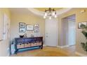 Warm and welcoming entryway with a decorative table, a round jute rug, and neutral colors at 3308 Purple Martin Dr # 121, Punta Gorda, FL 33950