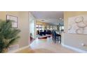 Inviting open-concept living area with tile flooring, dining area and bar seating for casual dining at 3308 Purple Martin Dr # 121, Punta Gorda, FL 33950