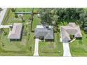 A bird's eye view of the property showing the house, backyard, and surrounding neighborhood at 4062 Blitzen Ter, North Port, FL 34287