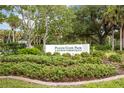 Landscaped entrance to Prairie Creek Park, a ranch community at 5950 Cypress Grove Cir, Punta Gorda, FL 33982