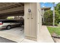 Assigned parking spaces with unit numbers beside an exterior storage area at 5230 Lake Arrowhead Trl # 29, Sarasota, FL 34231