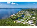 Waterfront home situated on a tranquil waterway with quick access to open water and nearby amenities at 161 Danforth Dr, Punta Gorda, FL 33980