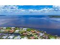 Breathtaking aerial view of the waterfront neighborhood with stunning water views at 119 Creek Se Dr, Port Charlotte, FL 33952
