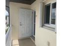 Balcony with exterior door, window, and space for outdoor enjoyment at 25275 Rampart Blvd # 207, Punta Gorda, FL 33983