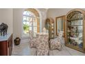 Charming breakfast nook with a glass table and four chairs at 8074 Wiltshire Dr, Port Charlotte, FL 33981