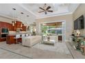 Open floor plan with a modern kitchen and luxurious living space at 8074 Wiltshire Dr, Port Charlotte, FL 33981