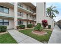Condo building exterior showcasing a unit entrance at 175 Kings Hwy # 1014, Punta Gorda, FL 33983