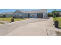 Spacious driveway leading to the garage of this beautifully maintained single Gathering home at 13525 Dibella Ave, Port Charlotte, FL 33981