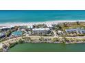 Aerial view of the community, highlighting its amenities and beach proximity at 5700 Gulf Shores Dr # B134, Boca Grande, FL 33921