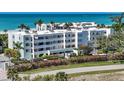 Aerial view showcasing the building's beachfront location at 5700 Gulf Shores Dr # B134, Boca Grande, FL 33921