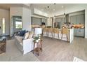 Modern kitchen with island and bar seating at 8250 Arlewood Cir, Port Charlotte, FL 33981