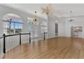 Spacious living room with high ceilings and hardwood floors at 26021 Templar Ln, Punta Gorda, FL 33983