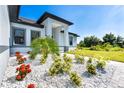 Landscaped entryway with modern finishes at 11042 Carnegie Ave, Englewood, FL 34224