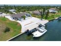 Property features boat lift, covered boat storage, and RV parking at 245 Spaniards Rd, Placida, FL 33946