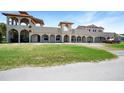 Mediterranean home with multiple levels and balconies at 14234 River Beach Dr, Port Charlotte, FL 33953