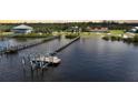 Aerial view of waterfront property with private docks at 14234 River Beach Dr, Port Charlotte, FL 33953