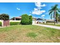 Single Gathering home with attached garage and landscaped yard at 570 Foxwood Blvd # 196, Englewood, FL 34223