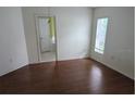 Bright bedroom with wood floors at 2332 Potomac Mark Pl, Ruskin, FL 33570