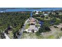 Aerial view of a waterfront home on a canal with quick access to the Gulf at 3440 Downing W St, Englewood, FL 34224