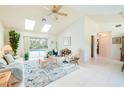 Spacious living room with vaulted ceilings and lots of natural light at 3440 Downing W St, Englewood, FL 34224