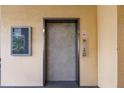 Building's elevator in hallway at 8409 Placida Rd # 308, Placida, FL 33946