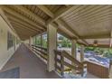 Building exterior with hallway and parking lot at 6 Quails Run Blvd # 7, Englewood, FL 34223