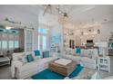 Spacious living room with comfy sofas and coastal decor at 10136 Amy Ter, Port Charlotte, FL 33981