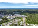 Aerial view of community and surrounding area at 755 Butterfield Cir, Englewood, FL 34223