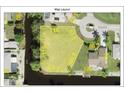 Aerial view of waterfront lot with dimensions marked at 2614 Oberon Rd, Englewood, FL 34224