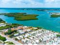 Aerial view showcasing a property's location near water at 2375 N Beach Rd # 3A, Englewood, FL 34223