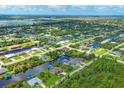 Community overview showcasing waterfront homes and canals at 15608 Lakeland Cir, Port Charlotte, FL 33981