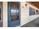 Condo building exterior showcasing a unit's entrance at 8 Quails Run Blvd # 10, Englewood, FL 34223