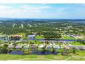 Community overview featuring waterfront homes and lush landscaping at 249 Rotonda Cir, Rotonda West, FL 33947