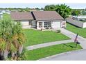 House with a screened porch, and a large backyard at 6367 Facet Ln, Port Charlotte, FL 33981