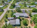 Aerial view of single Gathering home with large backyard and RV at 797 Michigan Ave, Englewood, FL 34223