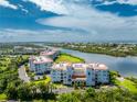 Waterfront community featuring upscale buildings and canals at 11100 Hacienda Del Mar Blvd # 202, Placida, FL 33946