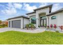 Beautiful house with a two-car garage at 15424 Lakeland Cir, Port Charlotte, FL 33981