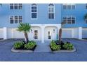 Two unit entrances with landscaping and garage access at 3923 Cape Haze Dr # 306, Rotonda West, FL 33947