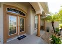 Inviting front entrance with double doors and decorative glass at 240 White Marsh Ln, Rotonda West, FL 33947