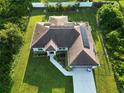 One-story house with solar panels at 2236 Gascom St, North Port, FL 34288