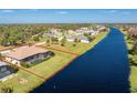 Single-Gathering home with private backyard and canal access at 849 Rotonda Cir, Rotonda West, FL 33947