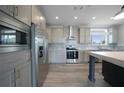 Modern kitchen with stainless steel appliances and island at 19196 Raymond Ave, Port Charlotte, FL 33954