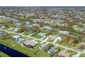 Aerial view showing home and lot, desirable location, and neighborhood at 529 Boundary Blvd, Rotonda West, FL 33947